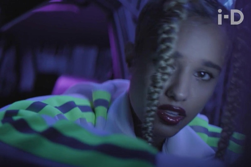 i-D video still: Tommy Genesis in a neon-striped Brashy Studios piece